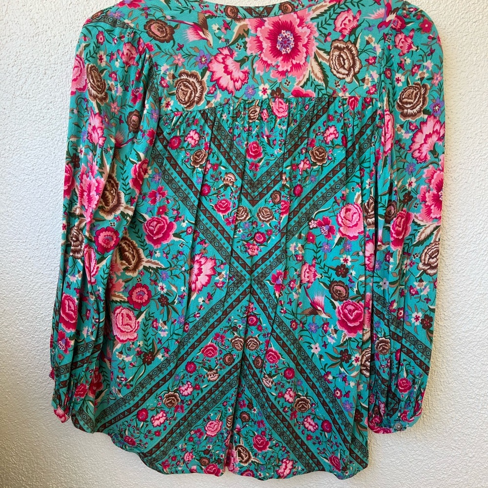 Spell button up